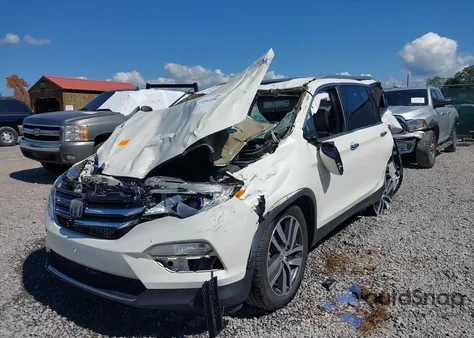 2017 Honda Pilot Elite z USA, uszkodzony, nr VIN 5FNYF6H07HB096053